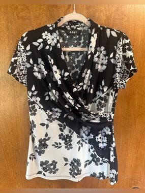 Women’s medium DKNY Black & White Floral Wrap-Style Short Sleeve top blouse